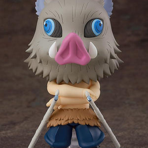 Full-body view of the Inosuke Hashibira Nendoroid on a clear display stand with arms crossed.