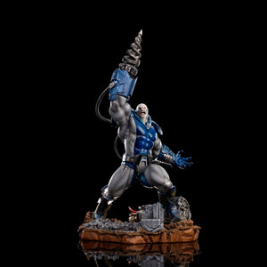 Full front view of the Iron Studios Apocalypse X-Men 1/10 scale statue, featuring the villain with a massive drill arm, standing on a destroyed Sentinel base.