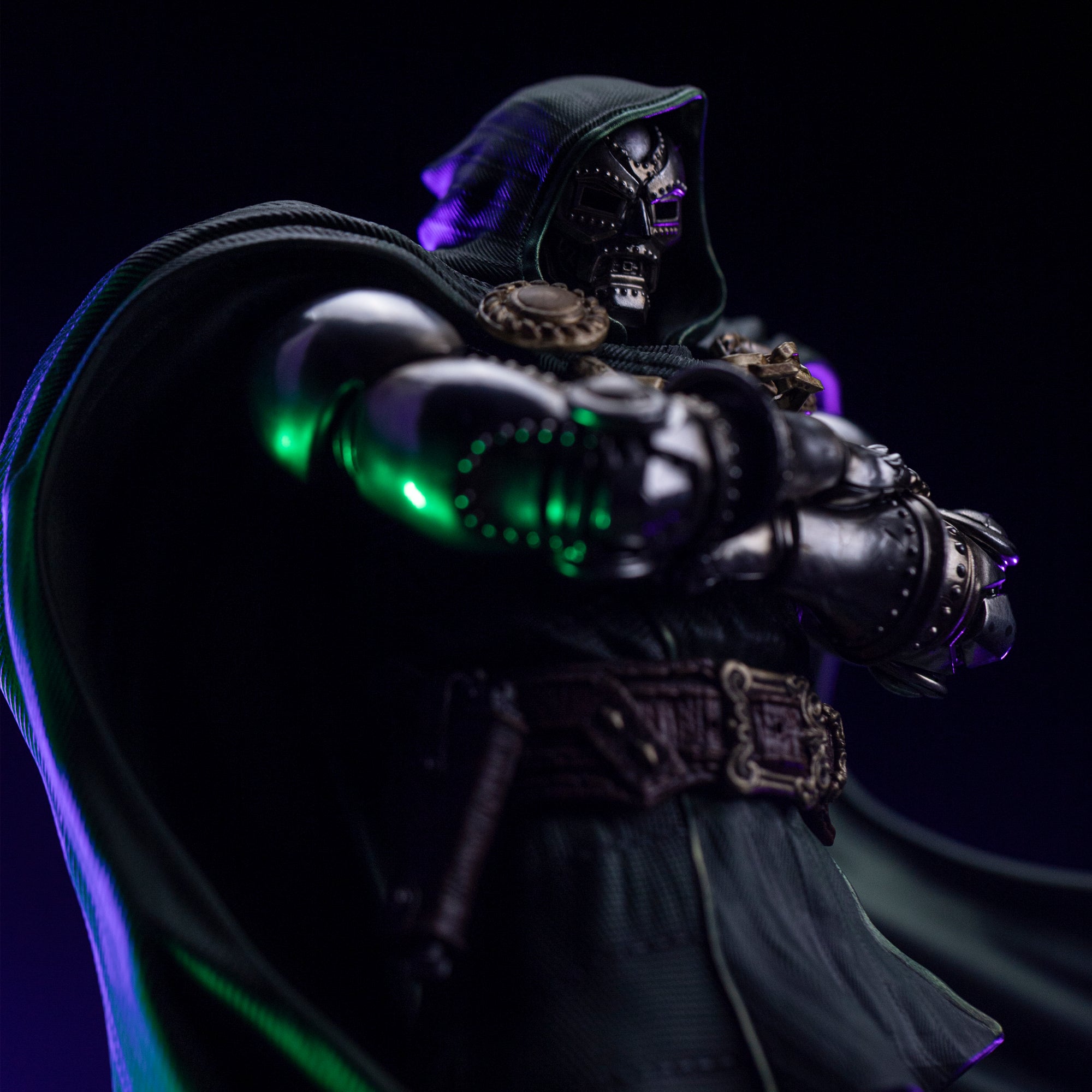 A close-up of Doctor Doom's mask and upper body armor, lit with dramatic green and purple light to emphasize his menacing presence.