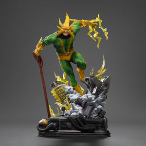 Full front view of the Iron Studios Electro 1/10 Scale Statue, showing the villain leaping over an industrial base with translucent yellow lightning effects.