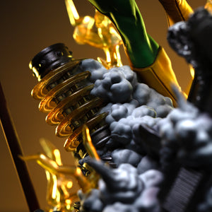 A close-up of the diorama base, highlighting a detailed metallic coil component next to the sculpted smoke effects.