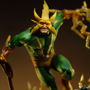 A close-up of the Electro statue's face, showing his yellow lightning mask and his furious, aggressive expression.