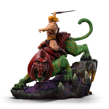 Side profile view of the He-Man riding Battle Cat 1/10 scale deluxe statue by Iron Studios, displayed against a solid black background.