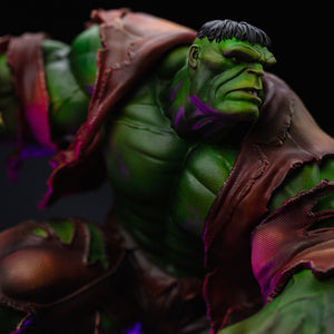 An extreme close-up of the Hulk Deluxe statue's face and upper chest, emphasizing his massive green muscles and angry expression.