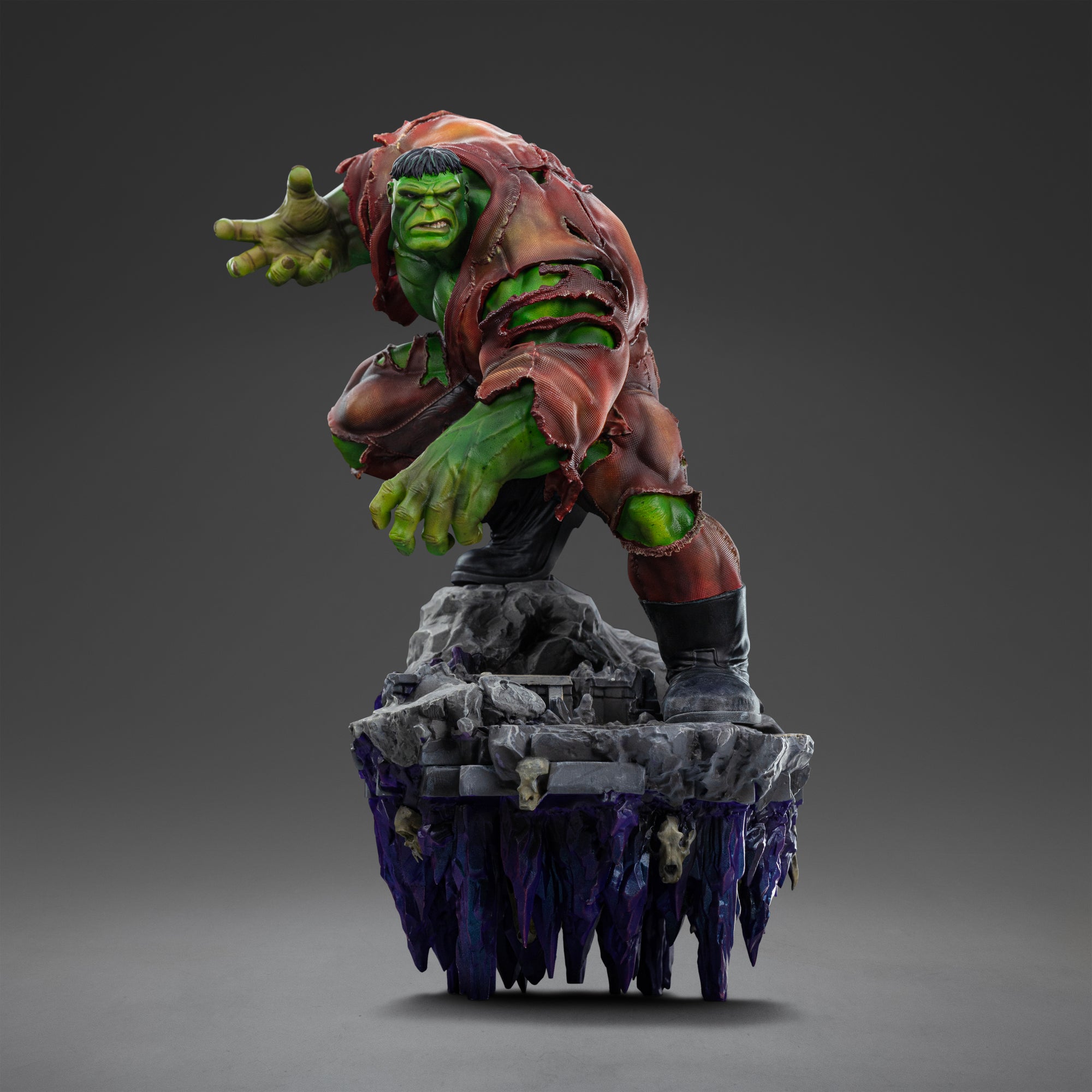Front view of the Iron Studios Hulk Deluxe 1/10 Scale Statue, showing Hulk in a charging pose on a complex, floating rocky diorama base with purple crystals.