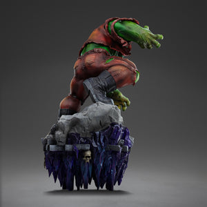 Rear view of the Hulk Deluxe statue, showcasing the texture of his torn clothing and the purple crystal formations extending beneath the base.