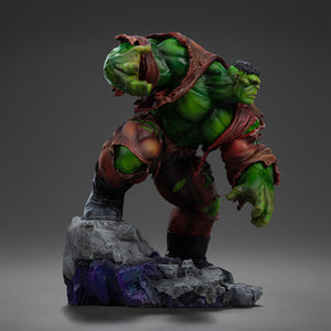 Left side view of the Hulk statue, emphasizing his powerful build and the dynamic motion of his body as he charges forward.