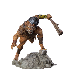 A clean product shot of the Iron Studios Jackalman statue, standing on its rocky base against a plain background.