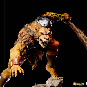 An extreme close-up of the Jackalman statue's head, showing the intricate sculpt of his facial features, snarling expression, and fur.