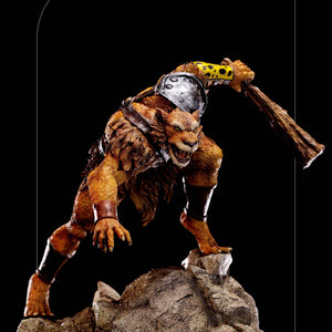 An eye-level, three-quarter view of the Jackalman statue, capturing the dynamism of his pose as he prepares to attack.