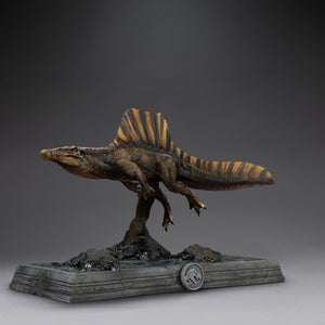 Iron Studios Icons Spinosaurus statue 3/4 front perspective view on rock water display base
