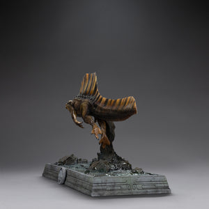 Rear view of Iron Studios Jurassic World Rebirth Icons Spinosaurus statue showing tail and dorsal sail