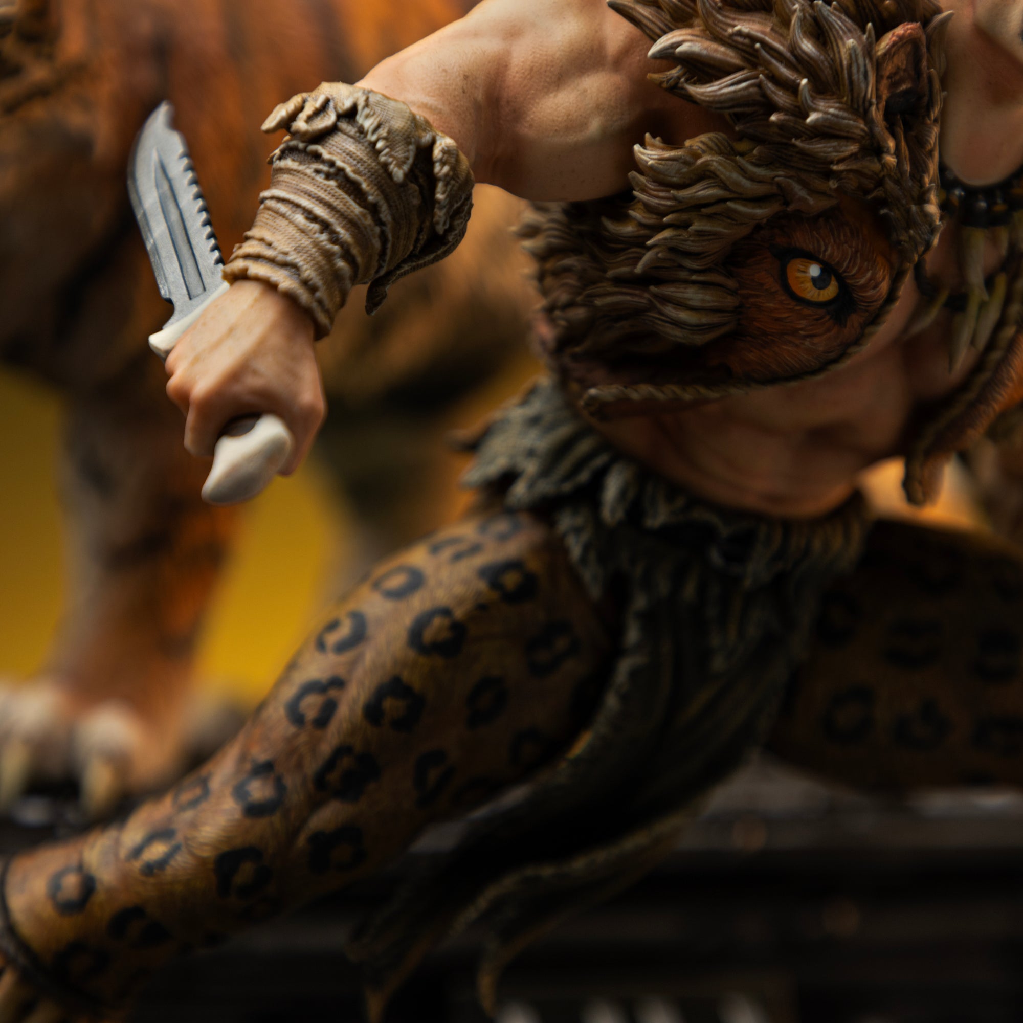 A close-up emphasizing the texture of Kraven's fur collar and his hand gripping the tactical dagger.