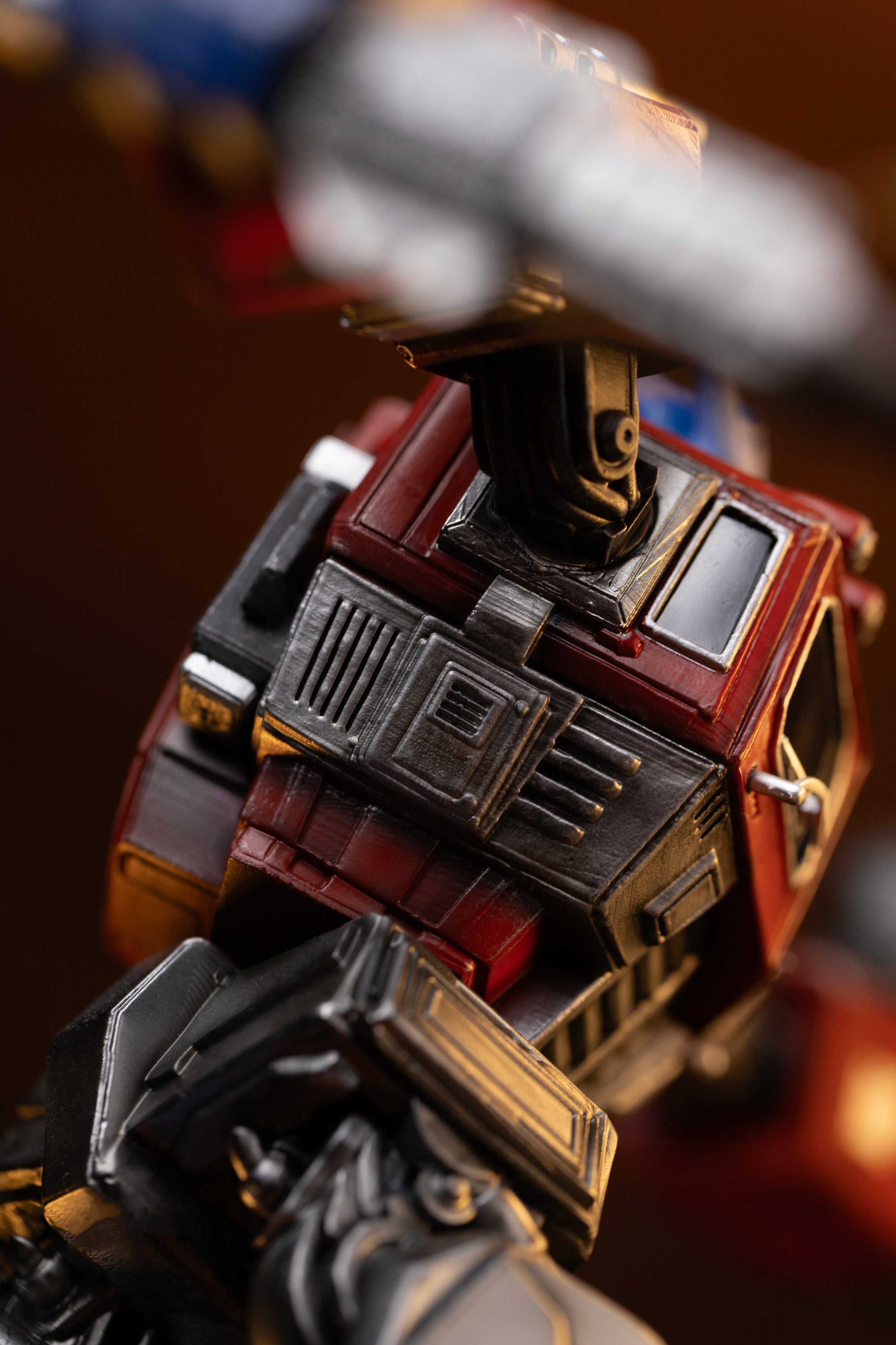 Close-up of the intricate sculpted mechanical vents, roof panel, and joints on the rear of the Optimus Prime statue.