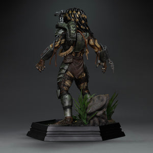 Rear view of Iron Studios Predator Jungle Hunter 1/10 scale statue showing Plasma Caster and backpack armor