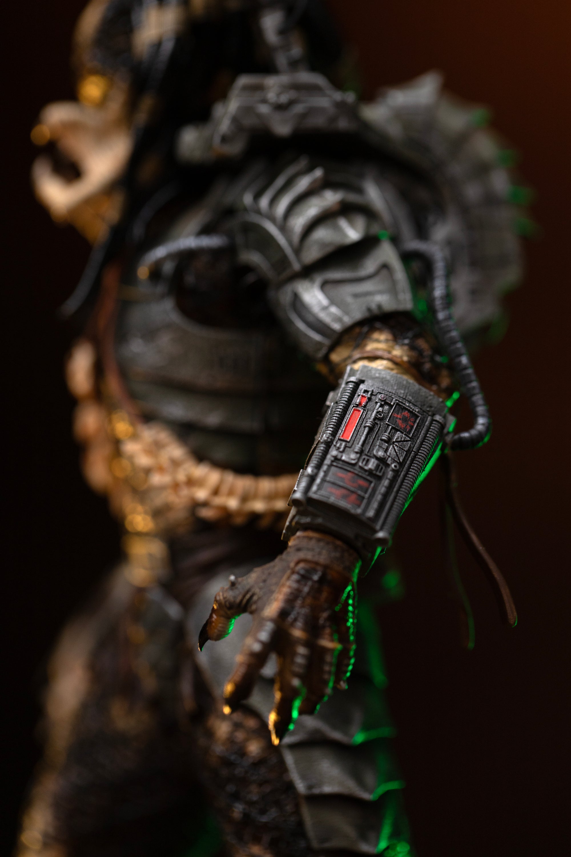 Close-up of Iron Studios 1/10 Predator Jungle Hunter gauntlet computer panel with red countdown glyphs
