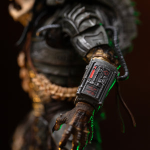 Close-up of Iron Studios 1/10 Predator Jungle Hunter gauntlet computer panel with red countdown glyphs