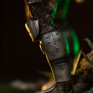 Side close-up of Iron Studios Predator Jungle Hunter 1/10 statue knee guard and lower leg armor plates