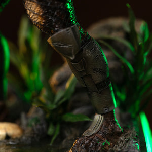 Close-up of Iron Studios Predator Jungle Hunter 1/10 statue shin guard armor plating and net suit texture