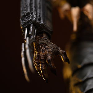 Detail of Iron Studios Predator Jungle Hunter 1/10 statue gauntlet with extended dual retractable wrist blades