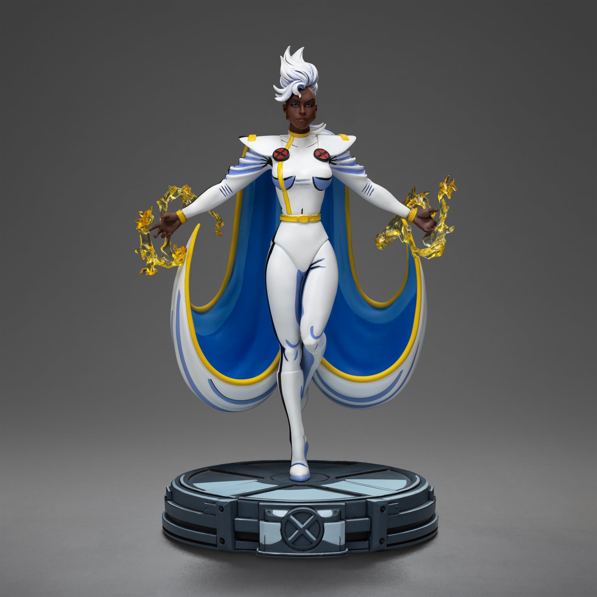 Full frontal view of the Iron Studios Storm X-Men '97 1/10 Scale Statue, showing her in her white costume with her arms outstretched, summoning lightning.