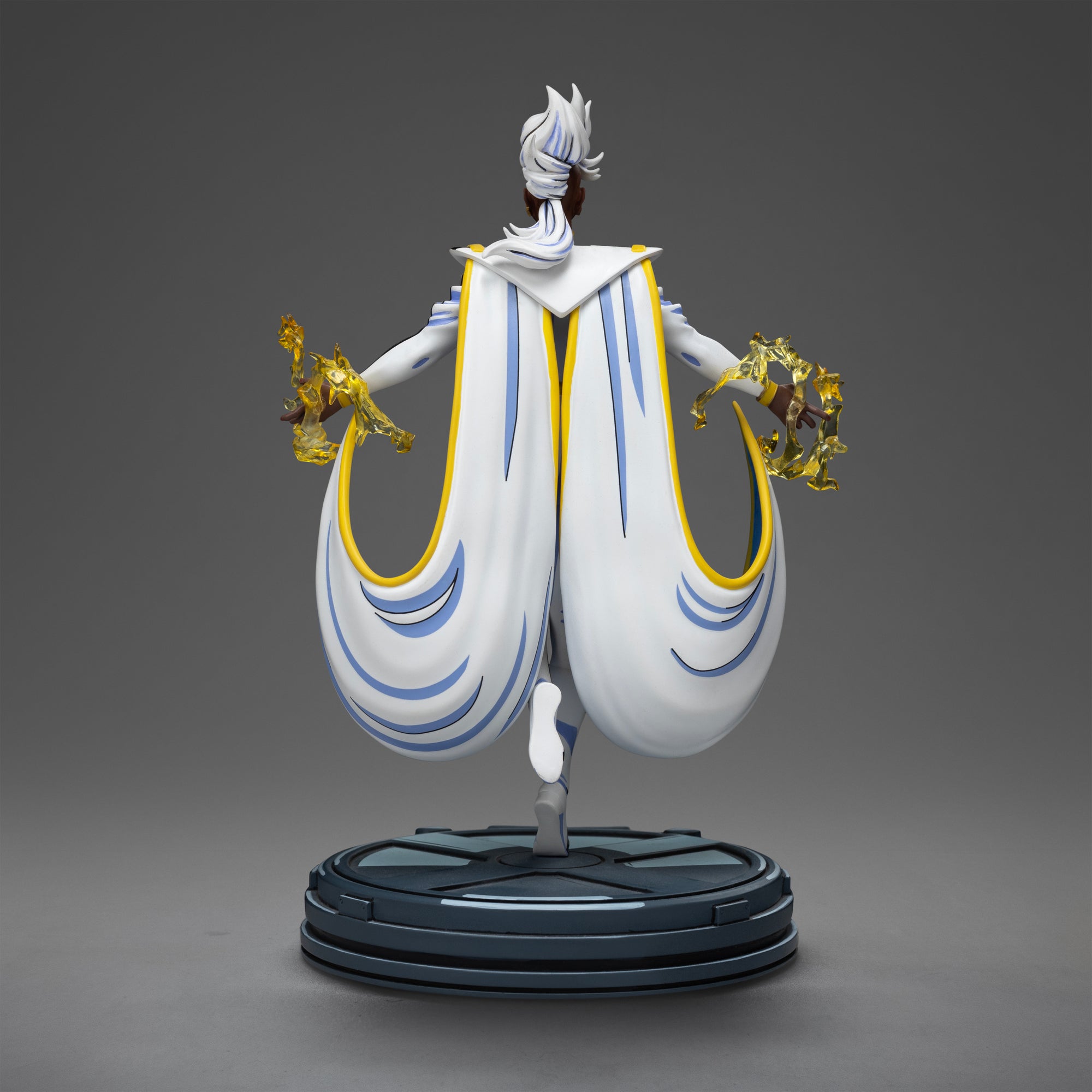 Rear view of the Storm statue, showcasing the full effect of her white and blue cape and her iconic white hair sculpt.