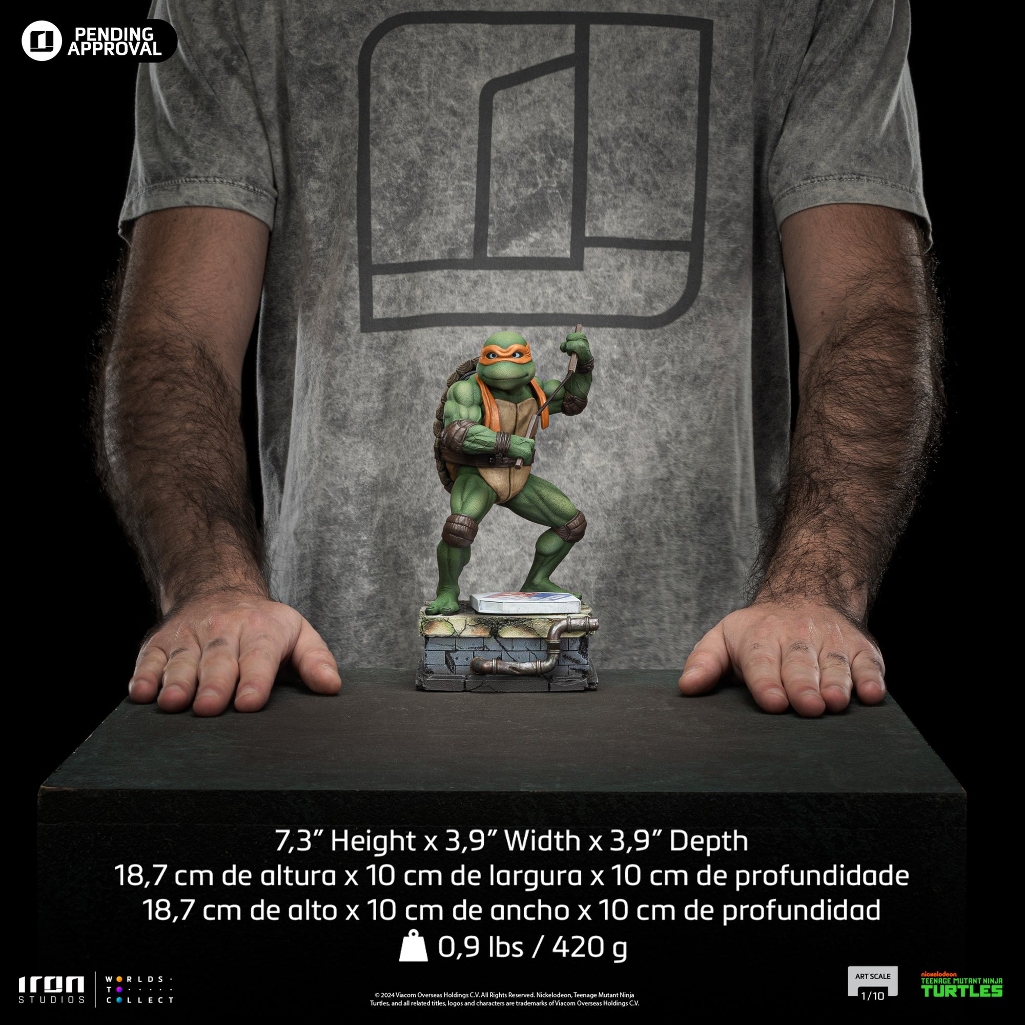 Scale and dimension guide showing the 7.3-inch height and weight of the Iron Studios TMNT 1990 Michelangelo 1/10 statue.