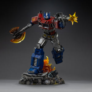 Full front view of the Iron Studios Optimus Prime 1/20 Demi Art Scale statue brandishing an Energon axe and firing an ion blaster.