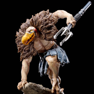 A close-up side-angled view of the Vultureman statue, highlighting his pose, staff, and the expression on his face.