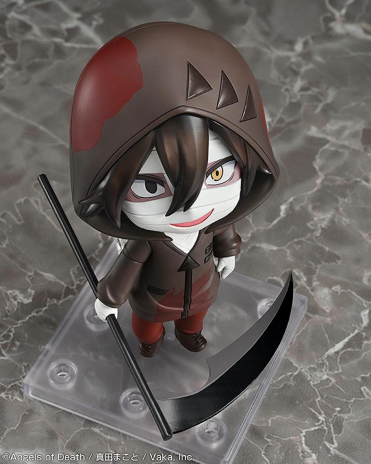 High-angle studio view of the Isaac Foster Nendoroid anime figure showcasing his bandaged face and blood-stained brown hoodie coat while resting on a grey surface.