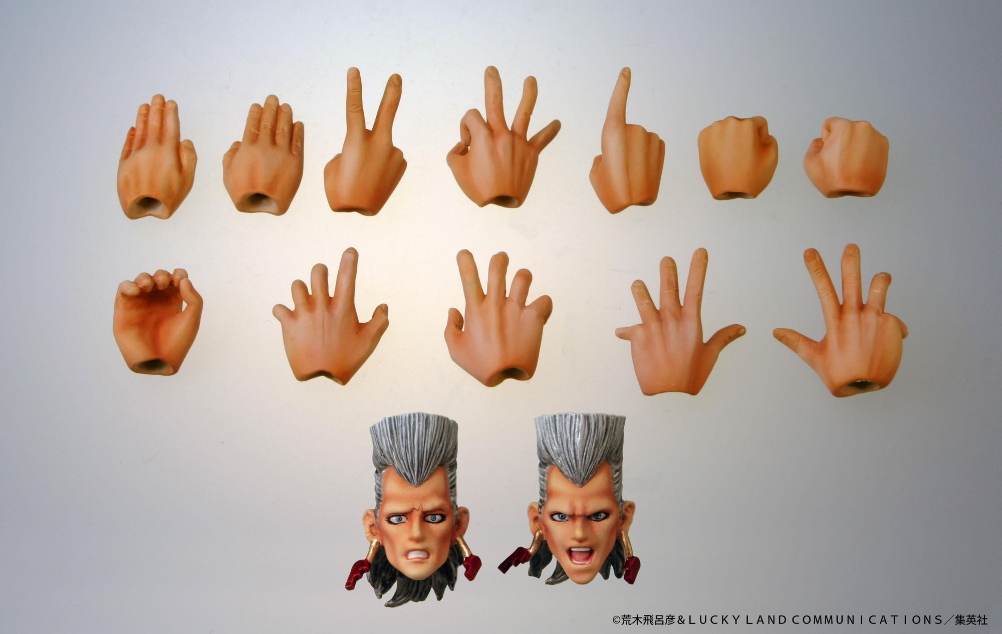 Layout of included accessories for Jean Pierre Polnareff Super Action Statue featuring interchangeable hands and extra heads