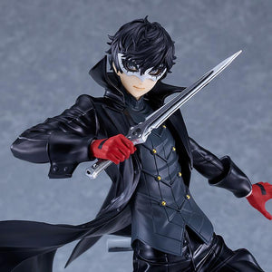 Detailed mid-shot of the Joker figure focusing on the intricate paintwork of his mask, eyes, and silver dagger.