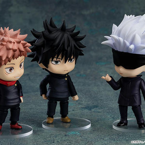 Satoru Gojo Nendoroid figure displayed side-by-side on clear bases with matching Yuji Itadori and Megumi Fushiguro Nendoroids.