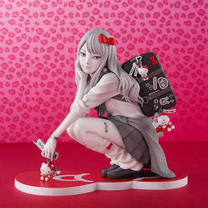 Full-body promotional display of the Gyaru Tomie x Hello Kitty figure posed against a vibrant pink leopard-print background.
