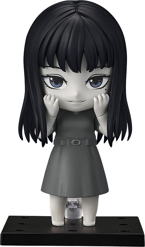Front view of Nendoroid Tomie from Junji Ito Maniac in monochrome grayscale with smiling face plate.
