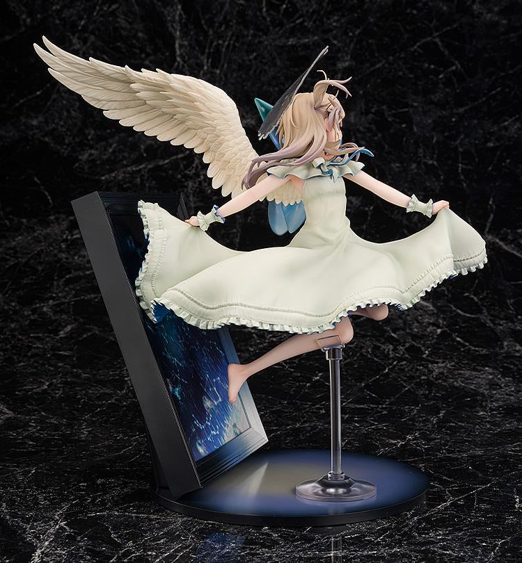 Rear view of the Illyasviel figure, emphasizing the sculpted white angel wings and the motion of her dress as she floats.
