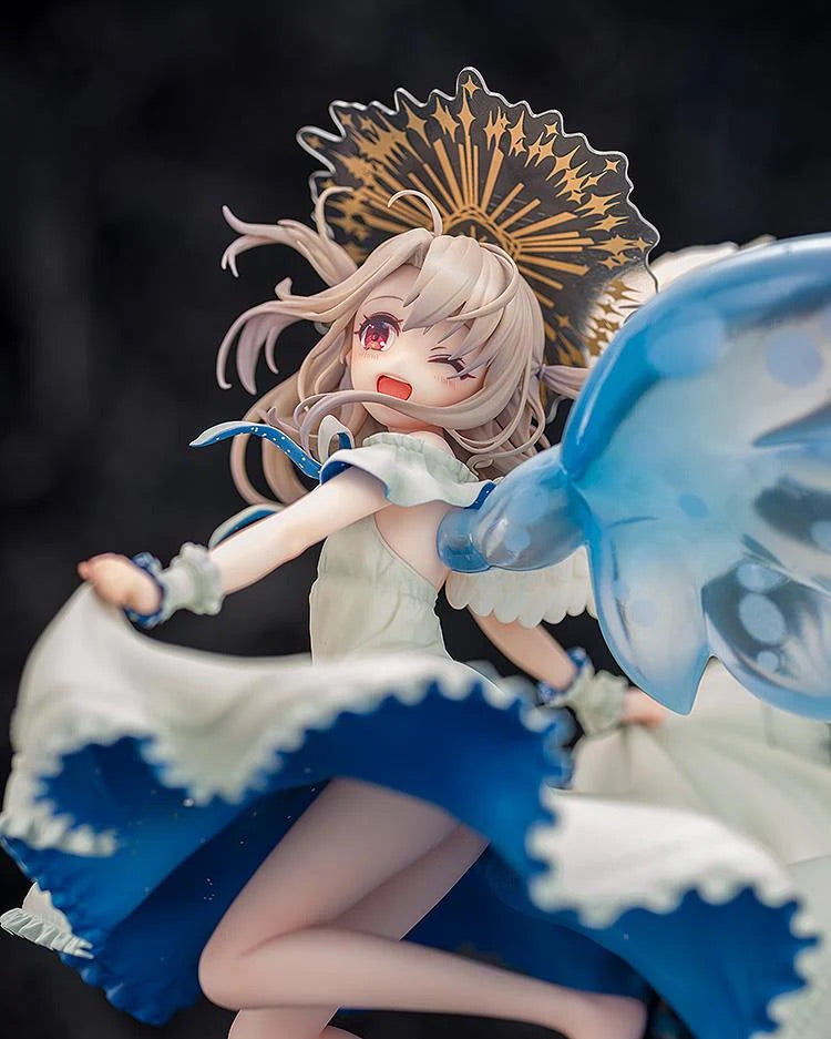 A close-up of the Illyasviel figure, focusing on her cheerful, open-mouthed expression and the highly detailed sculpt of her fluttering dress.