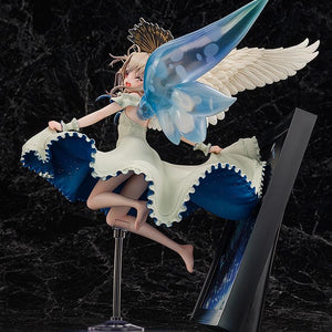 Side profile of the Illyasviel figure, showing the ethereal blue wings and the angelic sculpt of her hair and dress.