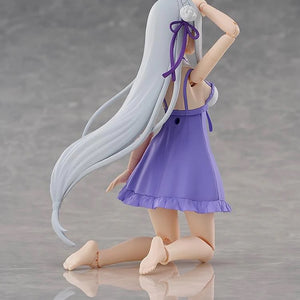 Rear view of the Emilia figure in her swimsuit, kneeling down and showing the long flow of her silver hair.