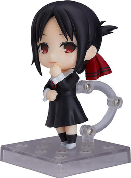 Full-body profile view of the Kaguya Shinomiya Nendoroid figure from Kaguya-sama: Love is War, wearing her black Shuchiin Academy school uniform and holding a hand to her chin on a white background.