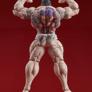 Flexing back pose showing the detailed tattoo application on the Digism figure.