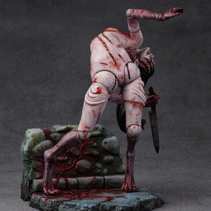 Low angle front view of the Kashimashi statue by Gecco, emphasizing the creature's height and the atmospheric base.