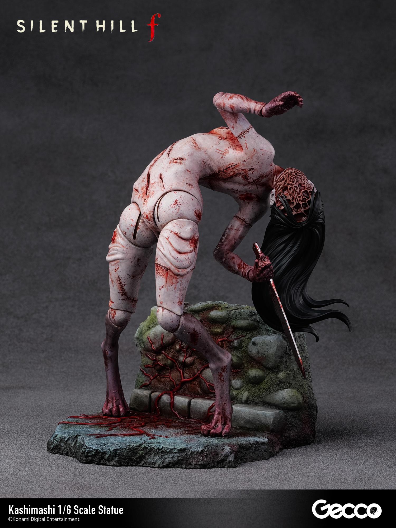 Front view of the Kashimashi statue with the interchangeable "sliced off" face part attached, revealing horrific inner textures.