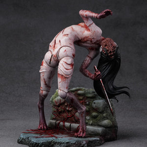 Front view of the Kashimashi statue with the interchangeable "sliced off" face part attached, revealing horrific inner textures.