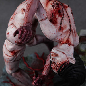 Top-down angled view of the Kashimashi's shoulder and neck area, showing the horrific wounds and detailed flesh sculpting.