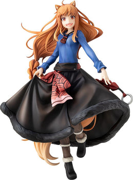 Cutout front view of the KD Colle Spice and Wolf Holo figure dancing in her blue shirt and dark skirt.