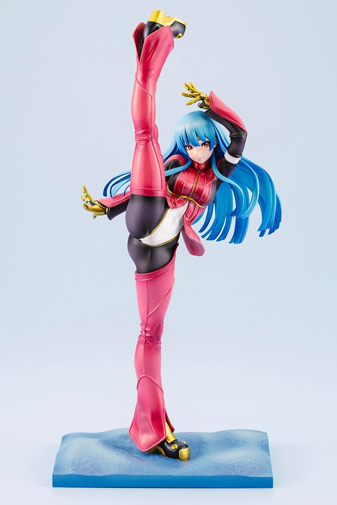 Full-length studio shot of the Kula Diamond Bishoujo collectible figure showcasing her iconic red and black jumpsuit and long blue hair.