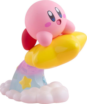 Studio side profile view of the POP UP PARADE Kirby figure riding a glossy yellow Warp Star, leaving a translucent rainbow cloud trail with yellow stars.
