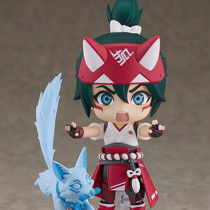 Dynamic battle scene setup with the Kiriko Nendoroid figure in a combat stance alongside her translucent blue spirit fox kitsune companion on the display base.