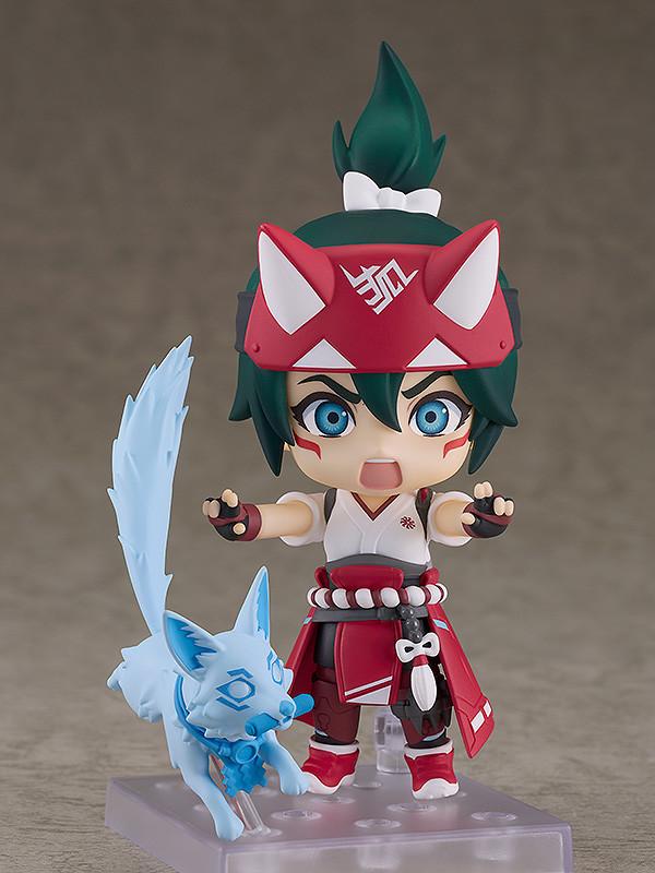 Dynamic battle scene setup with the Kiriko Nendoroid figure in a combat stance alongside her translucent blue spirit fox kitsune companion on the display base.